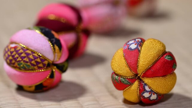 Traditional Japanese Temari Ball Close Up on Tatami Mat Right