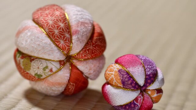 Traditional Japanese Temari Ball Gently Rolling on  Tatami Mat