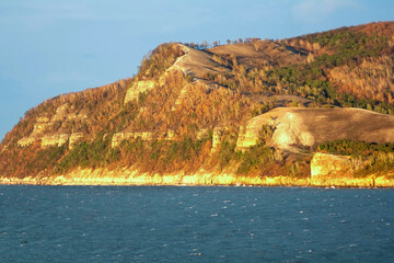 Scenic view of Molodetsky Kurgan from the Volga cliff on an autumn sunny day.