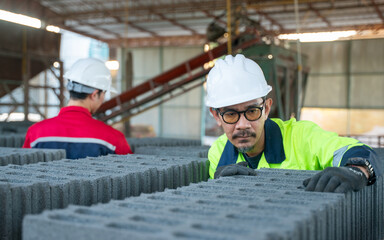 A supervisor conducting a hands-on audit of the finished goods inventory in the warehouse area.