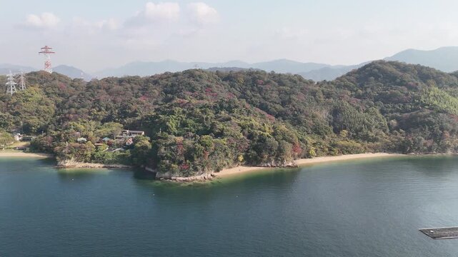 Kanawa Island, Minami Ward, Hiroshima Bay, Japan Coastline: 4K Aerial Drone Footage of Forest Mountains, Rural Island, Autumn Colours, Beaches, Clear Ocean Water, Fish Cage