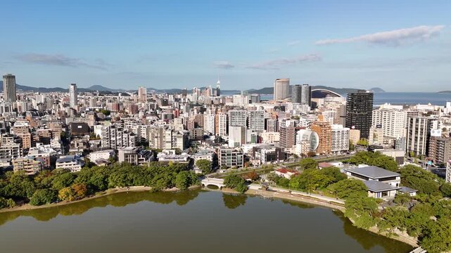Fukuoka City, Kyushu, Japan &ndash; 4K Aerial Drone Footage of City Skyline, CBD, Ohori Park, Maizuru Park, Urban Lakes, Autumn Trees, Harbour, Port Area, Modern High-Rise Architecture, Houses and Apartment