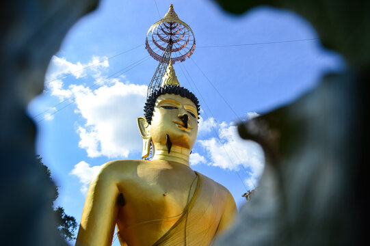 Golden Buddha Statue, Lanna Architecture, Symbols of Buddhism, South East Asia at Wat Phra Phuttha Santiparangon Sri Phingkhonakhon Mongkhon (Phra Chao Ton Luang) Chiang Mai, Northern Thail