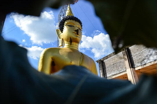Golden Buddha Statue, Lanna Architecture, Symbols of Buddhism, South East Asia at Wat Phra Phuttha Santiparangon Sri Phingkhonakhon Mongkhon (Phra Chao Ton Luang) Chiang Mai, Northern Thail