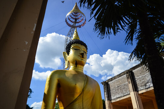 Golden Buddha Statue, Lanna Architecture, Symbols of Buddhism, South East Asia at Wat Phra Phuttha Santiparangon Sri Phingkhonakhon Mongkhon (Phra Chao Ton Luang) Chiang Mai, Northern Thail