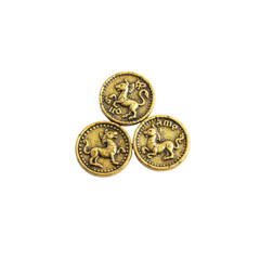Antique golden coins adorned with mythical creature engravings isolated on a dark backdrop
