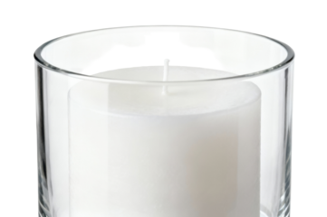 Illuminating a clear glass cylinder with a white candle and transparent silhouette atop