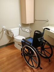 Toilet grab bars rail with wheelchair access bathroom safety concept