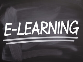 A conceptual image illustrating the term e-learning drawn with chalk on a dark chalkboard