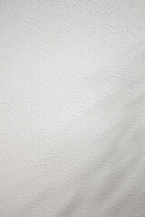 It's a white wall with shadows cast on it.