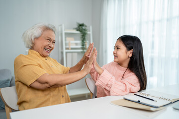 Latino young woman cleaning face with cotton pad and cleansing product. 