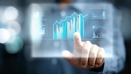 A professional touches a transparent screen with virtual charts and data visualizations, symbolizing innovation in finance. The scene highlights digital transformation and business intelligence - Powered by Adobe