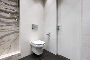 modern bathroom room with toilet and washing machine