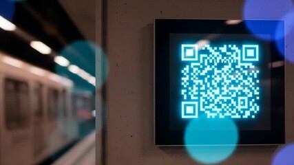 Glow-blue QR code on screen at night; blurry teal/blue lights & track in background - Powered by Adobe