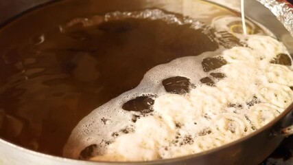 Jalebi an indian dessert deep fried then dipped in sugar syrup