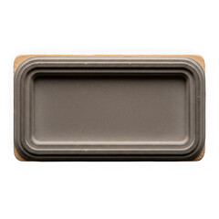 Gray metal baking pan on wooden board