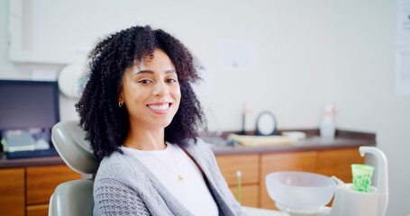 Portrait, woman and smile for dental care, clinic and confident for medical procedure or appointment. Happy, patient and oral health for person, healthcare and tooth extraction services in office