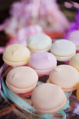 Colorful macarons on display at a market event