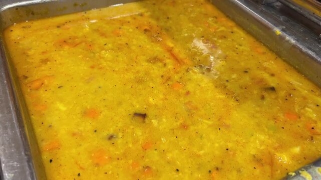 Special dal fry prepared with vegetables in a Bengali style