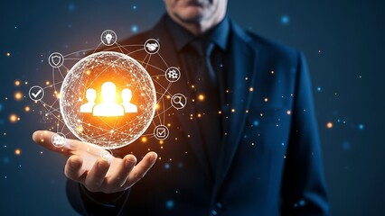 Businessman holding glowing digital globe with human resources and networking icons