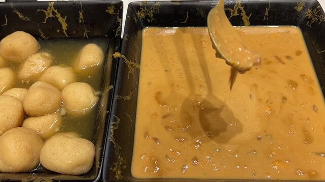 Nolen gurer rosogolla and paes served in a Bengali wedding in Kolkata