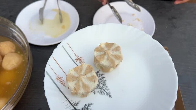 Bengali special winter sweets and rosogolla made with nolen gur 