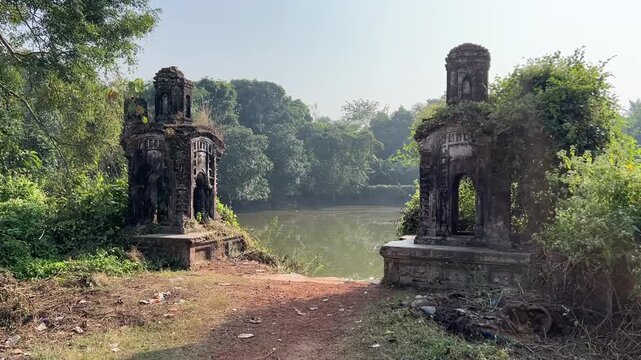 Stone temple gate near a pond of a Zamindar palace in Midnapore, West Bengal
