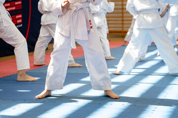 Kids in position for karate belt ceremony