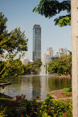 Lumpini Park Lake and City Skyline with Fountain, Bangkok
