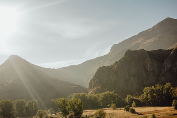 Morning Sun Rays Over Mountain