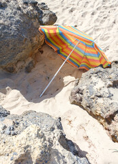 Colorful Beach Umbrella on Sandy Beach