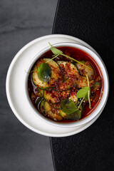 Salad of chopped cucumber and beans with Asian sauces