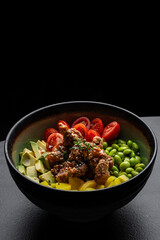 Poke bowl with chicken, tofu, yuuyama and vegetables isolated for menu
