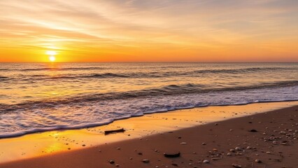 Beautiful sunset over the ocean waves on the beach