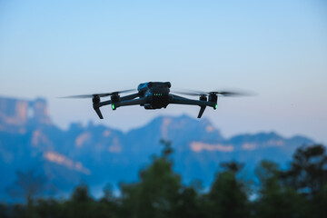 Drone flying at the top of mountains