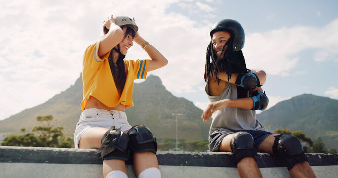 Rollerskate, relax and ramp with interracial couple at park for support, skating game and training. Rollerblade, fitness and bonding with man and woman outdoor for hobby, extreme sport and smile