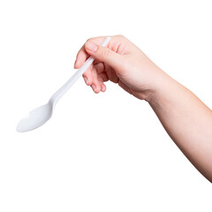 Female hand holding a white plastic spoon isolated on white background.