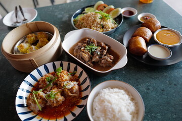 Deep fried bun served with salted egg sauce and sweet condensed milk, stir fry rice, Shumai(Chinese pork dumplings), stew ribs