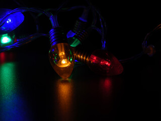 Colorful LED Christmas Lights Close-up in Darkness
