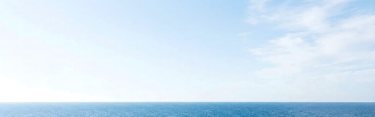 Serene Seascape: Vast Ocean Under Pale Blue Sky