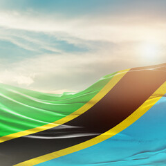 Tanzania national flag for poster. The flag waving in beautiful clouds with vertical layout. Tanzania national flag for independence day.