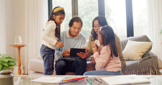 Children, girl and parents with tablet in lounge for online search, subscription site and family bonding. Check film selection, streaming app and people with tech to watch movie, connection and home - Powered by Adobe