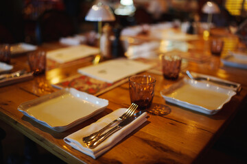 Dinner setting at a cozy restaurant in the evening