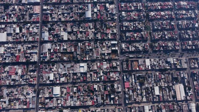 High drone view of Ecatepec&rsquo;s dense urban area under smog, Mexico City region