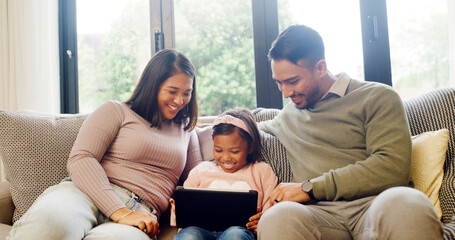 Child, girl and parents with tablet on couch for online search, subscription site and film for bonding. Check video selection, streaming app and people with tech to watch movie, smile and family home
