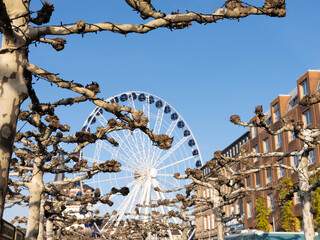 16.12.2025 Duesseldorf Germany - Ferris Wheel in Duesseldorf at the Christmas Market on Burgplatz. High quality photo