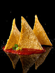 red chili pepper on black background