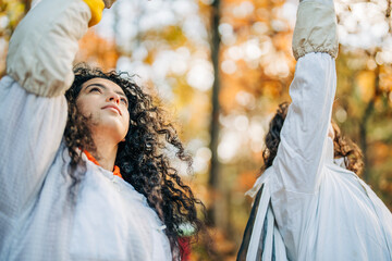 Beekeepers checking beehive in autumn forest