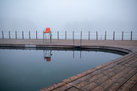 Foggy Poolside with Lifeguard Chair