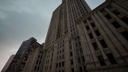 Fototapeta premium Majestic building stands tall against a twilight sky, showcasing intricate architectural details. Nearby structures hint at the bustling city life below, creating a stunning urban scene.